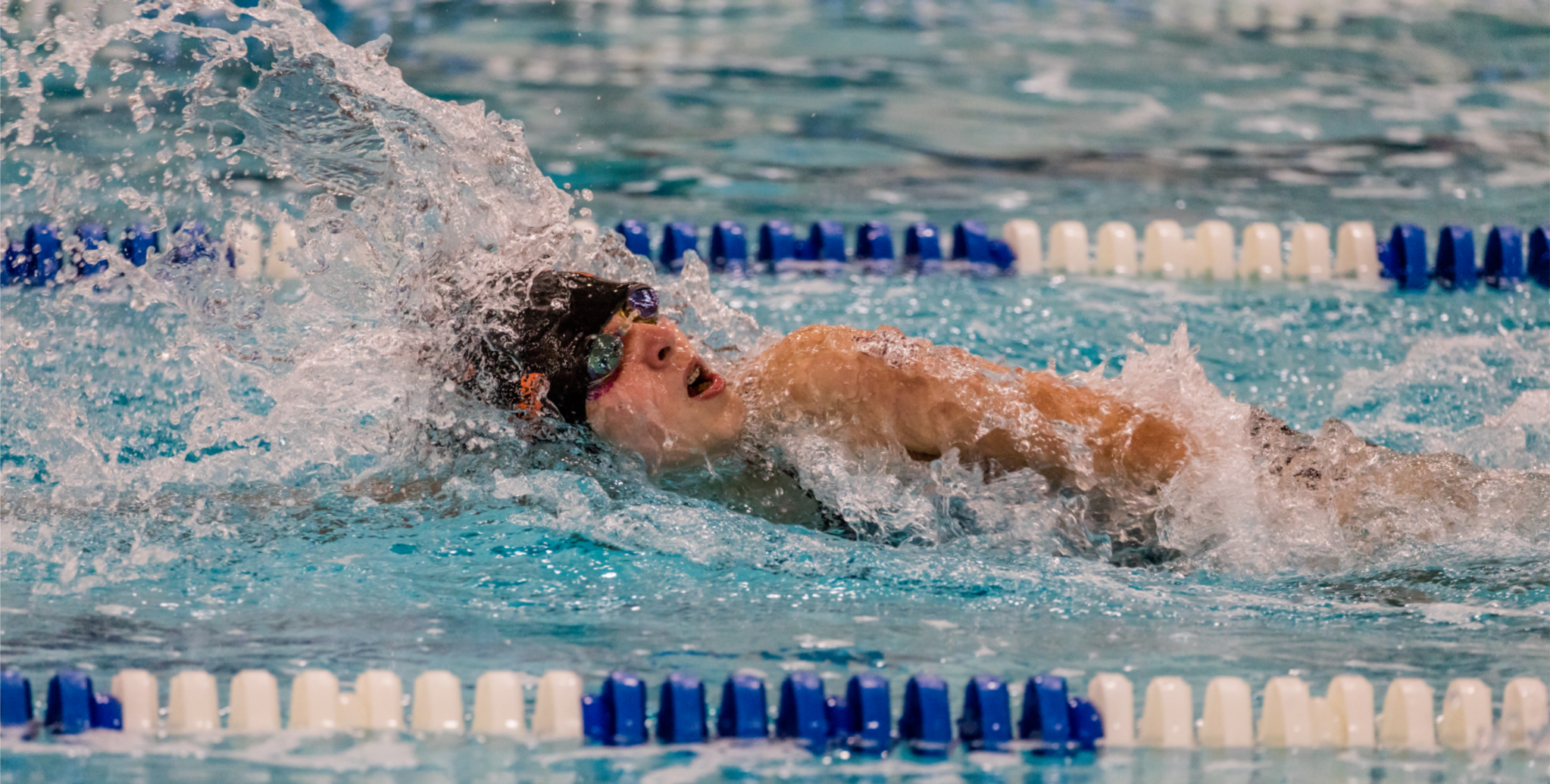 An image of Emily swimming.